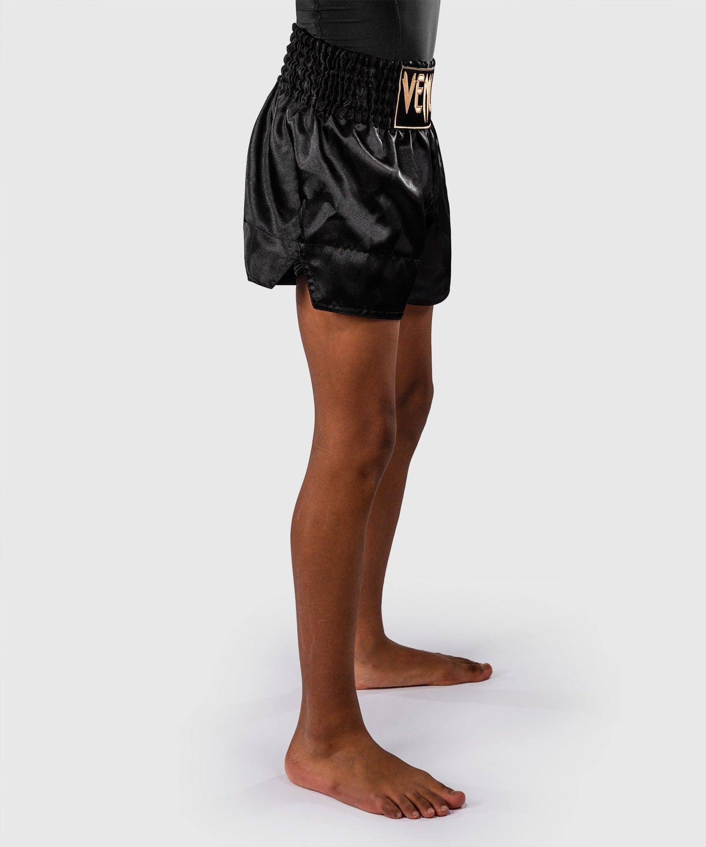 Venum Classic Muay-Thai-Shorts für Kinder – Schwarz/Gold