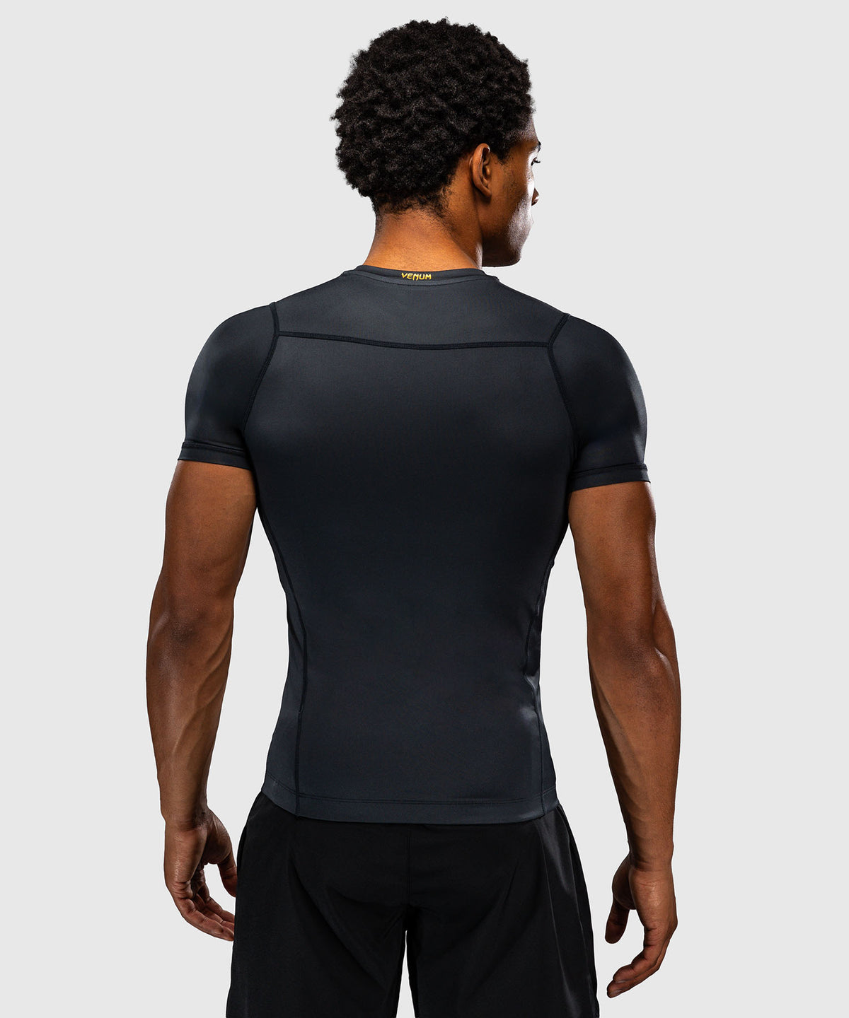 Rashguard manches courtes Venum Attack - Noir/Or
