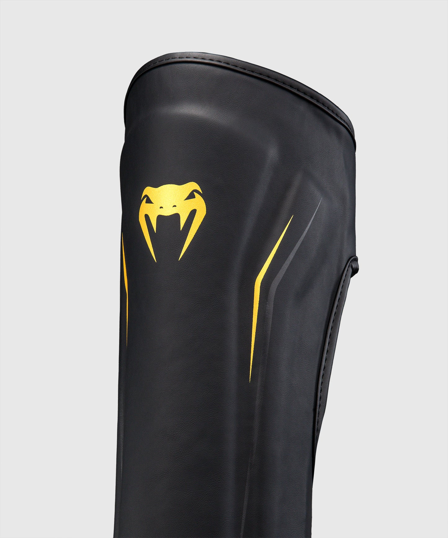 Venum G-Core Paratibie - Nero/Oro