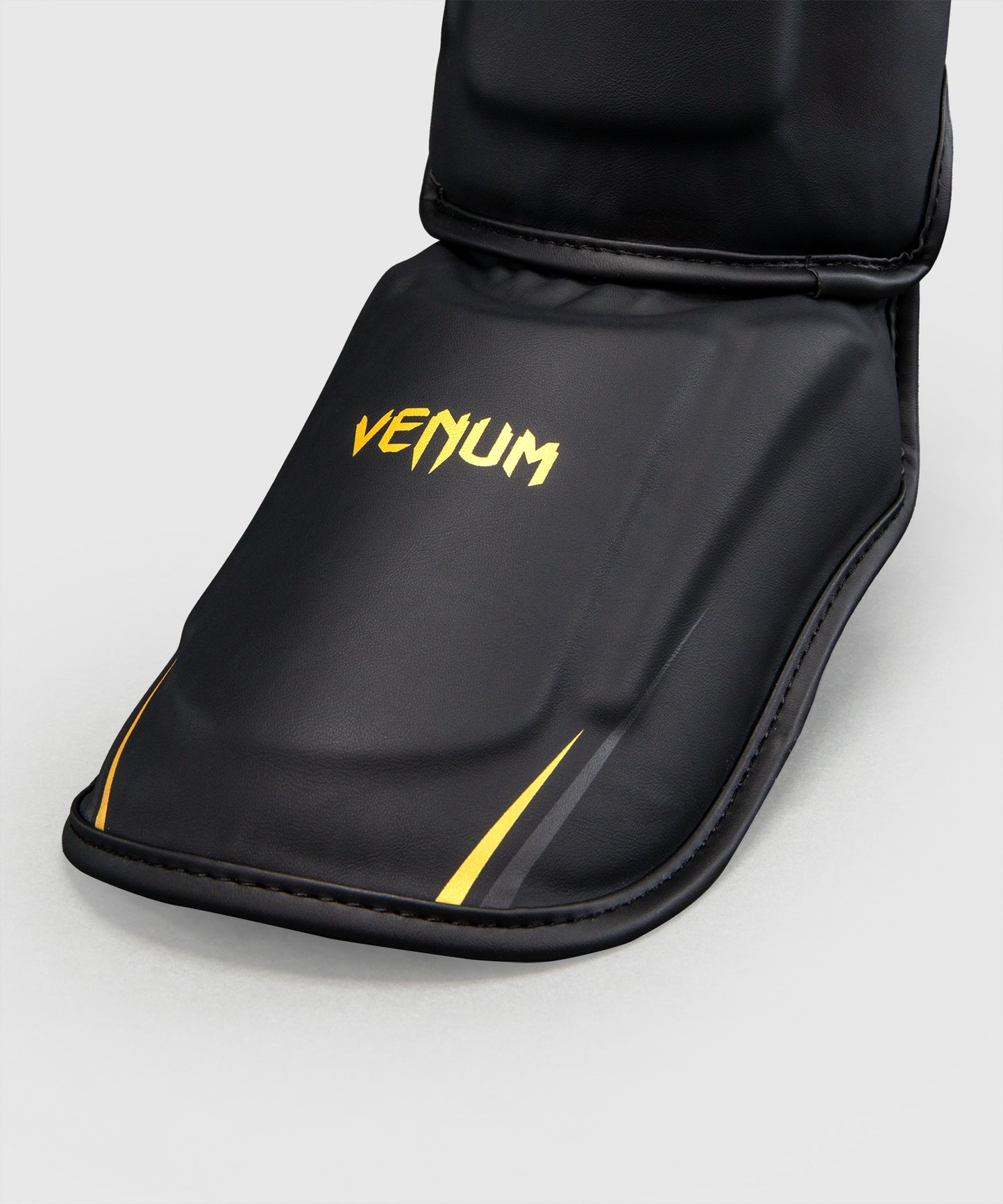 Venum G-Core Paratibie - Nero/Oro