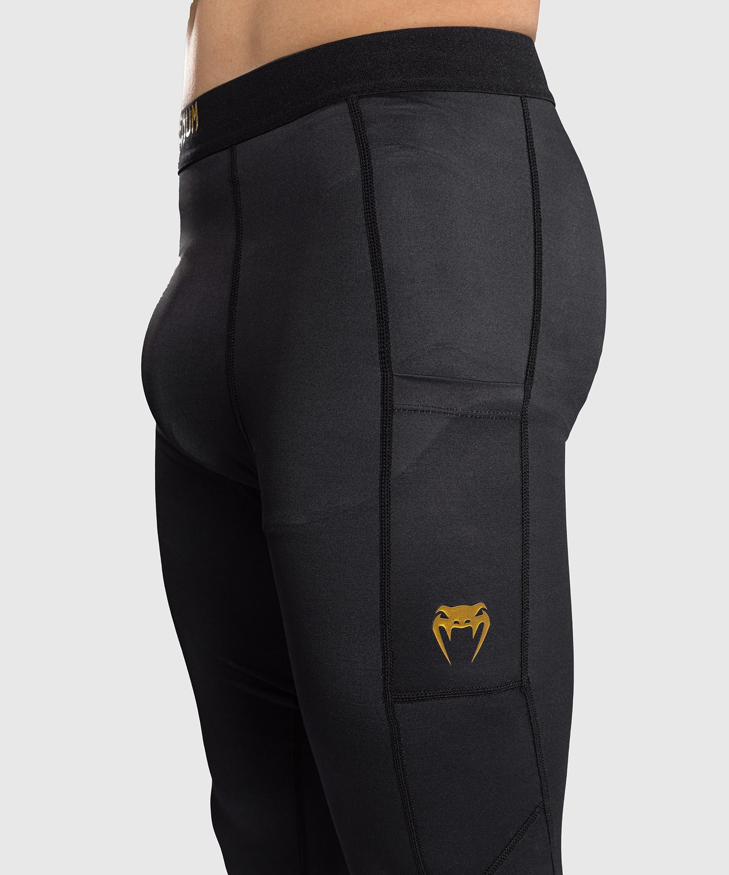 Venum Streamline Spats – Schwarz/Gold