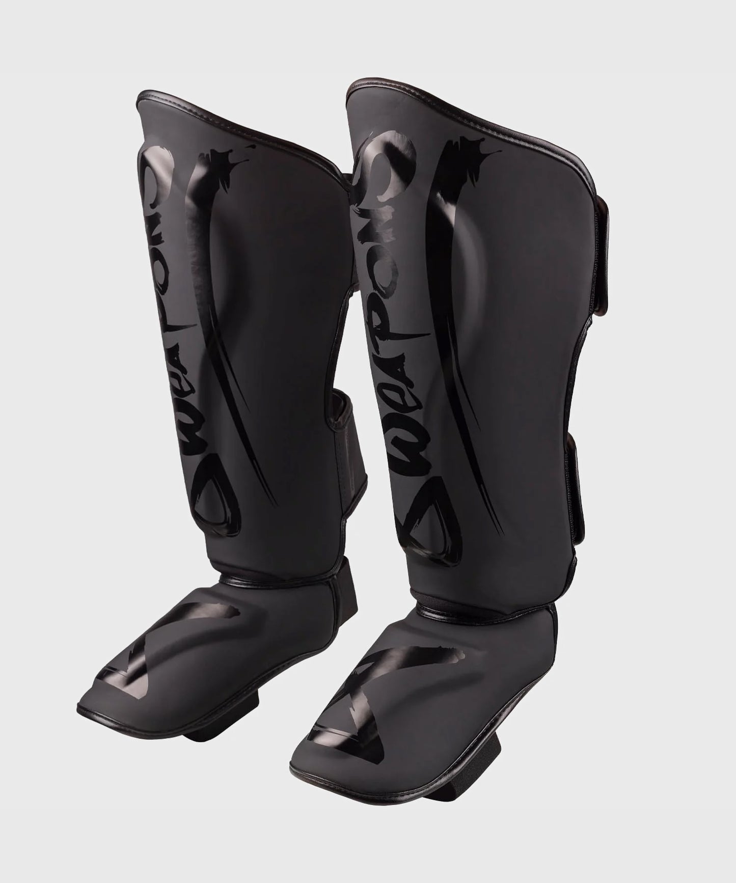 8 Weapons Unlimited 2.0 Espinilleras - Negro/Negro