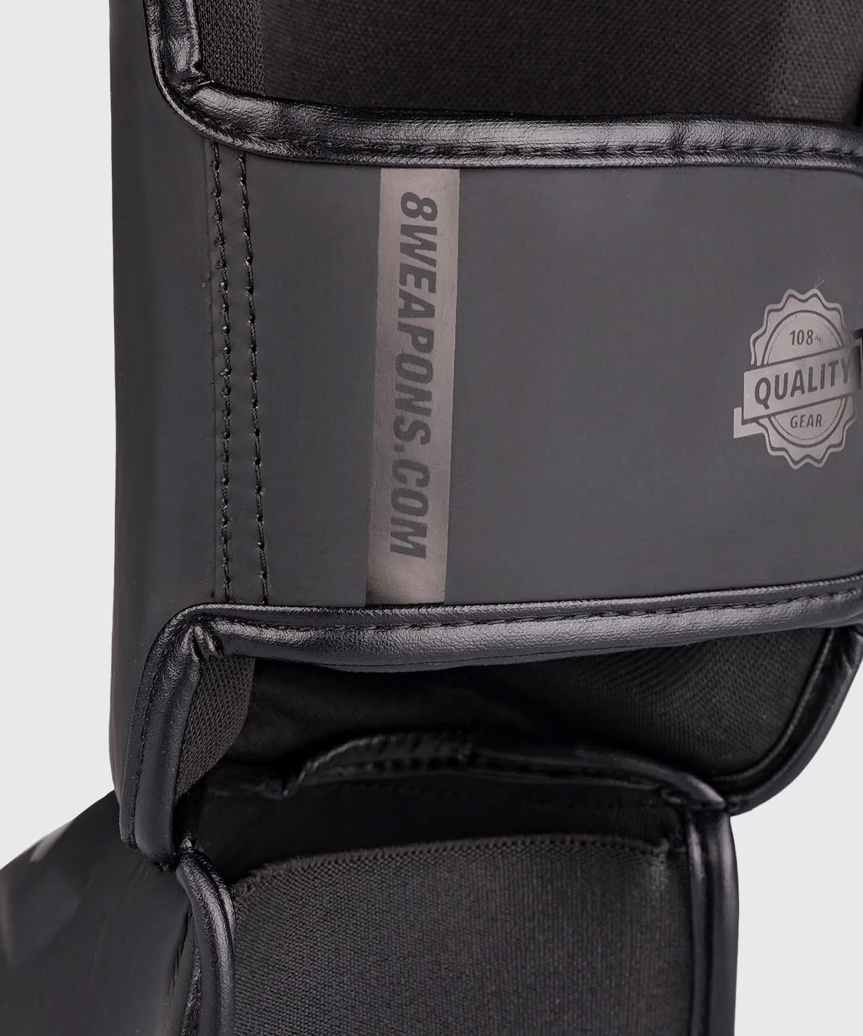 8 Weapons Unlimited 2.0 Espinilleras - Negro/Negro