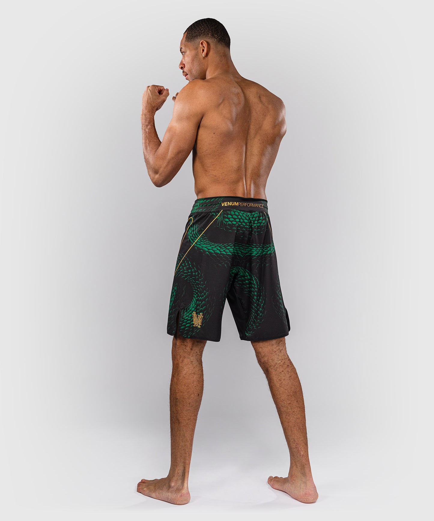 Venum Matupa Short de Combate - Negro/Verde/Oro