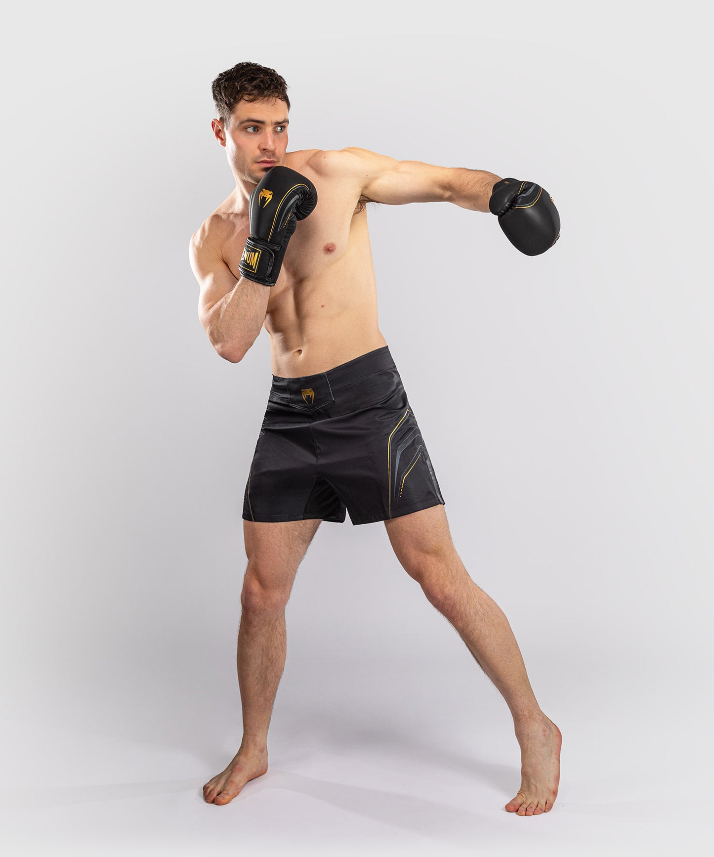 Venum Streamline Fightshorts – Schwarz/Gold