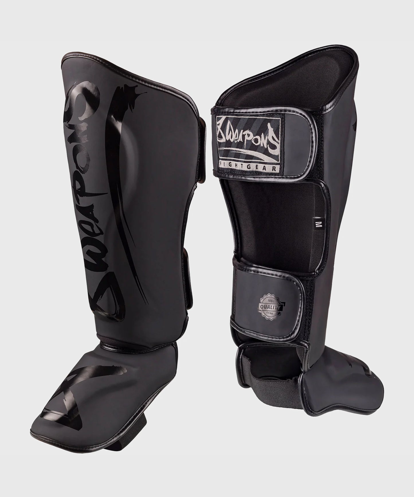 8 Weapons Unlimited 2.0 Espinilleras - Negro/Negro