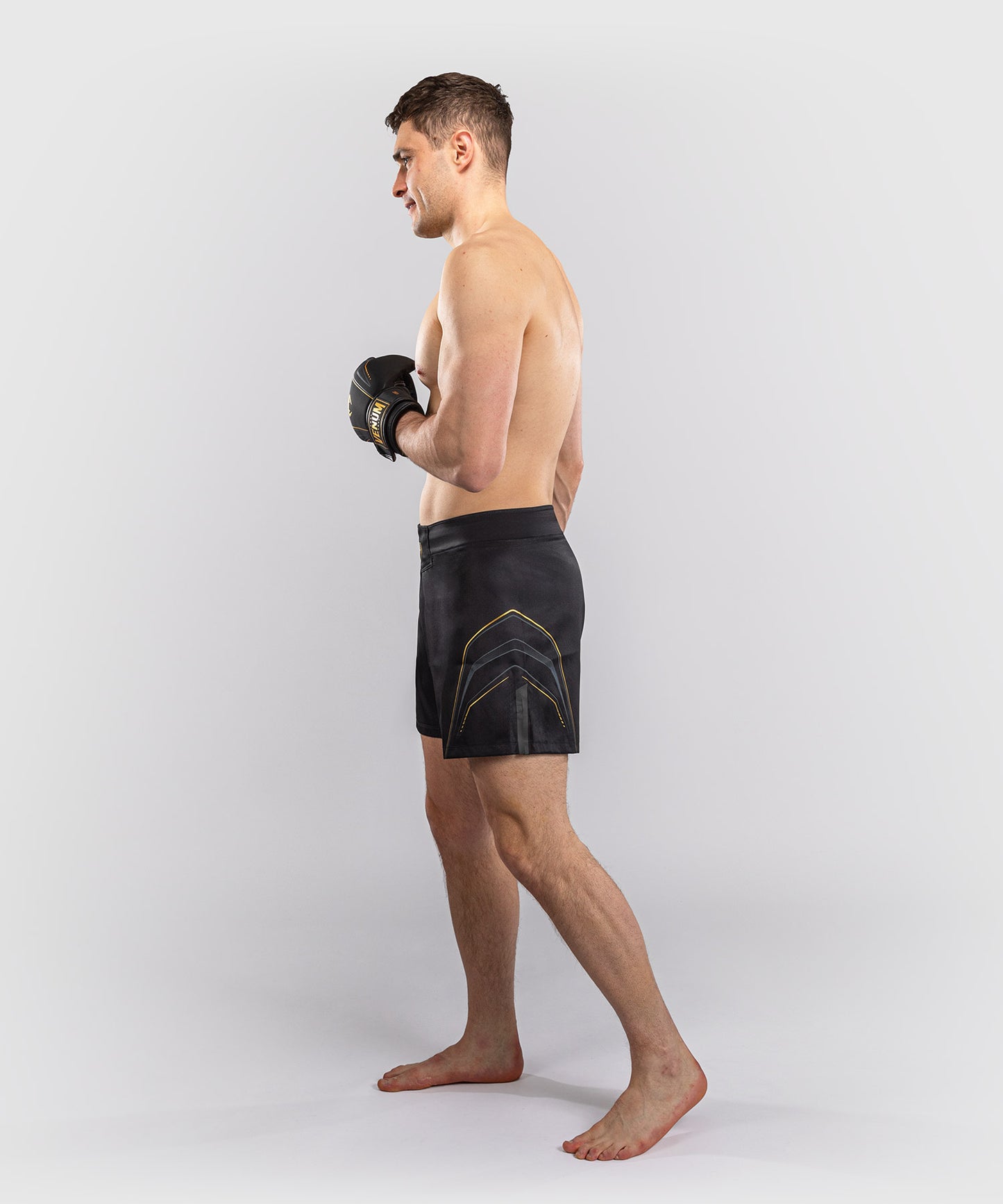 Venum Streamline Fightshorts – Schwarz/Gold