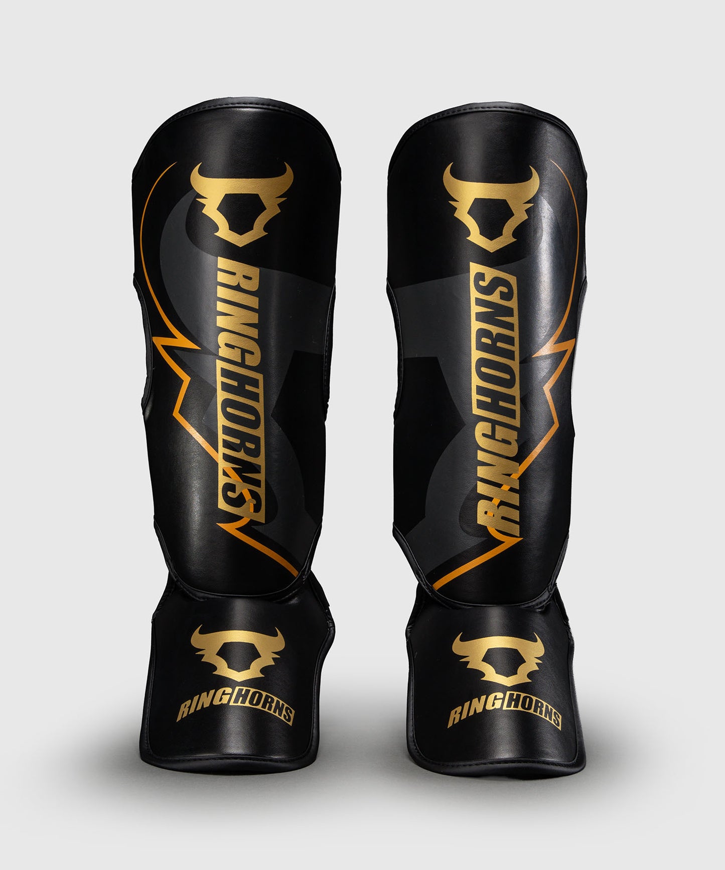 Protège-tibias Ringhorns Charger by Venum – Noir/Or