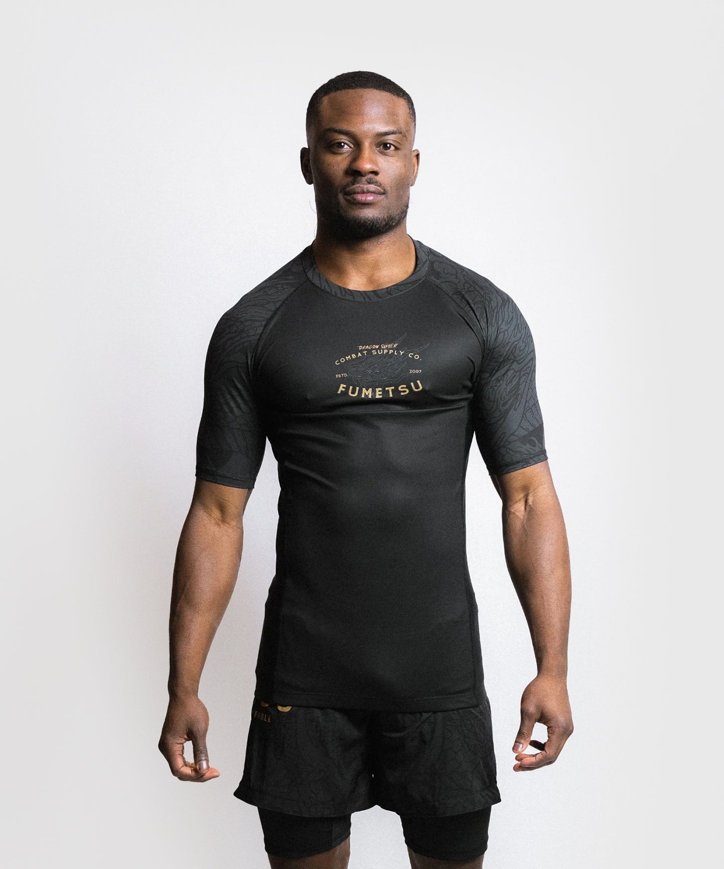 Fumetsu Dragon Slayer Rashguard a Maniche Corte - Nero/Oro