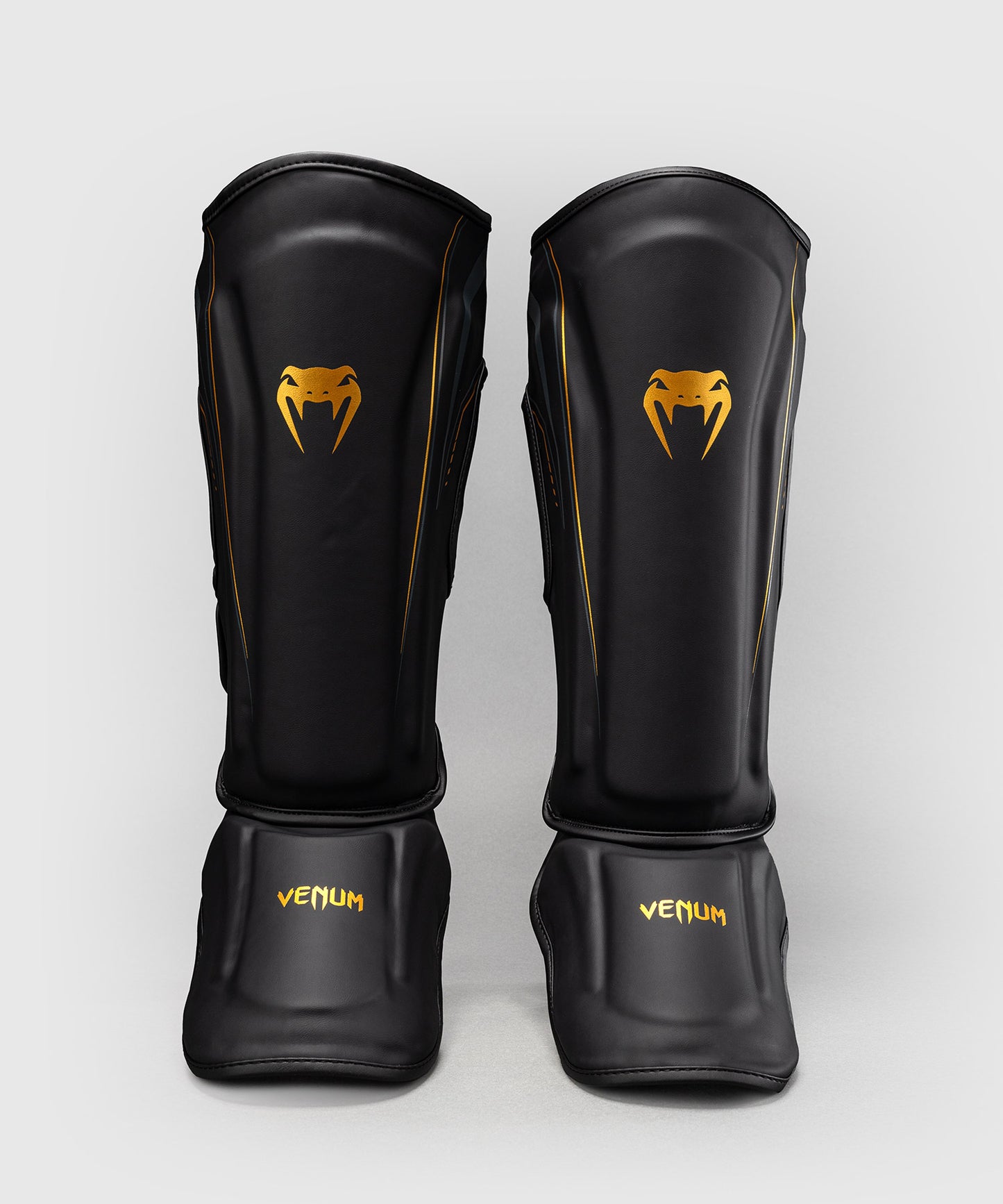 Venum Streamline Schienbeinschoner – Schwarz/Gold