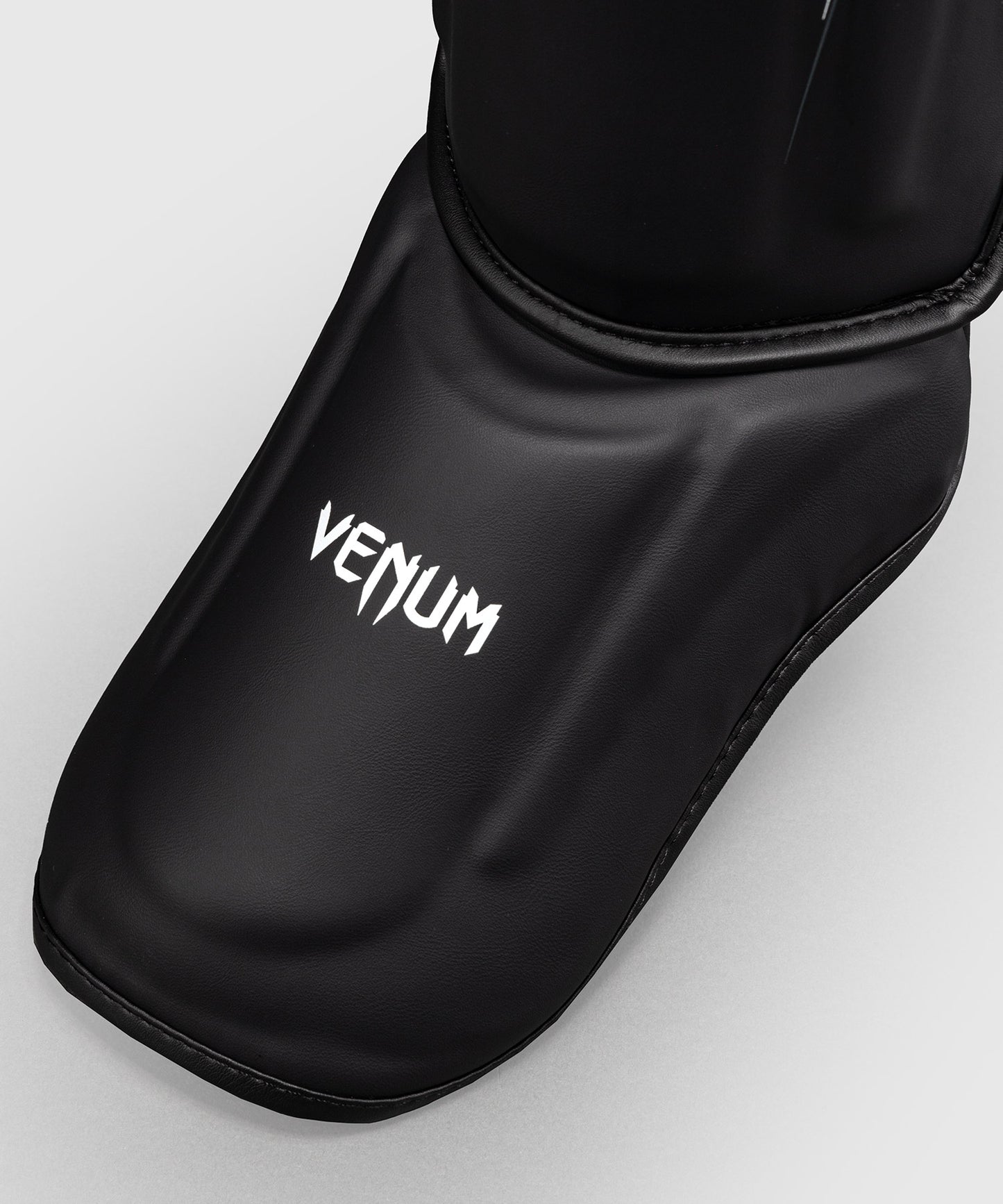 Protège-tibias Venum Streamline – Noir/Blanc