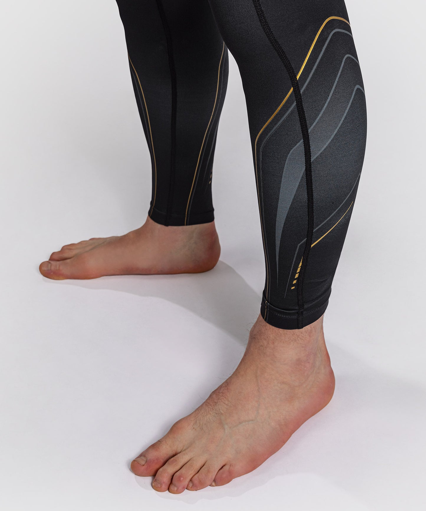 Venum Streamline Spats – Schwarz/Gold