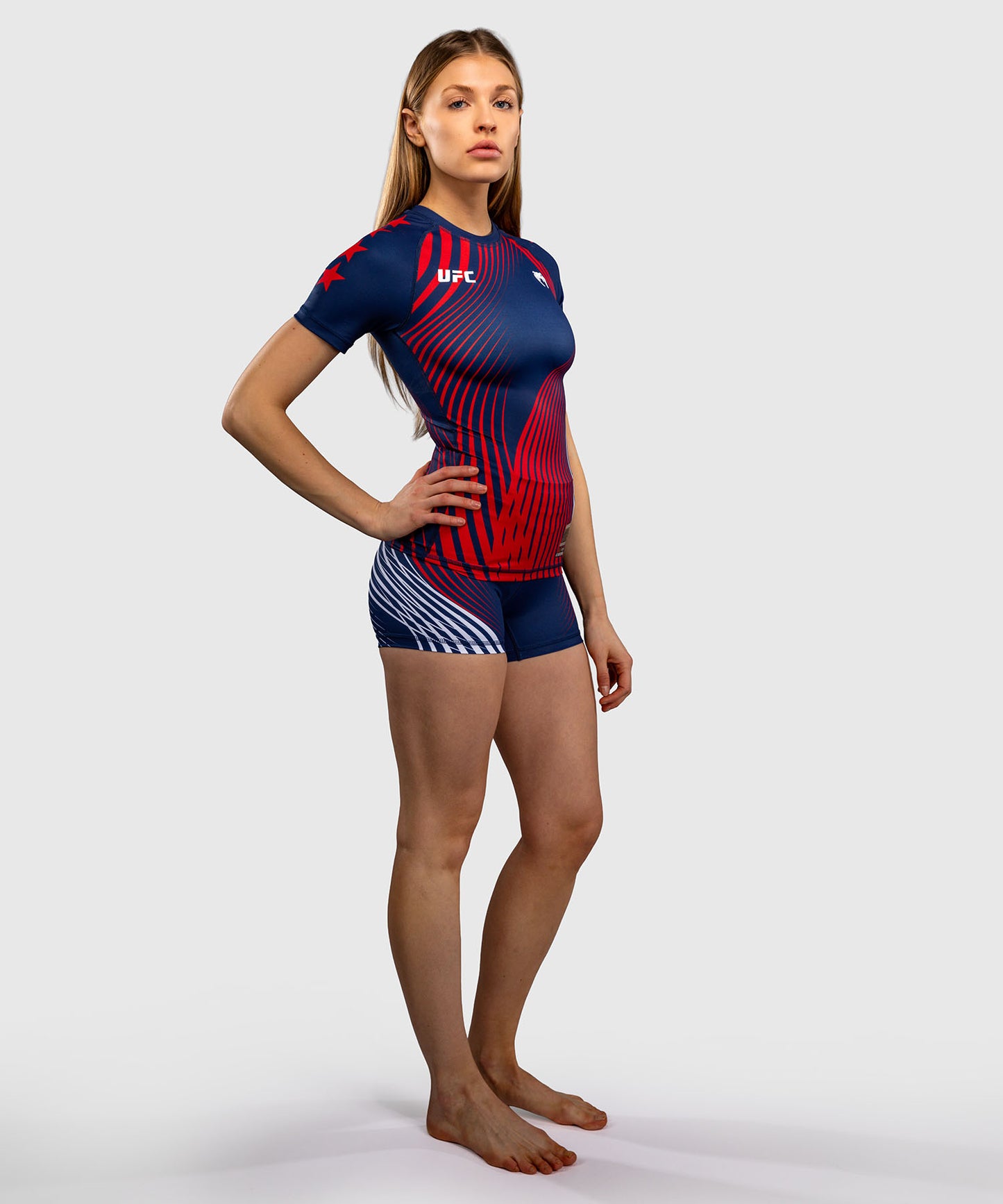 Official UFC Freedom 250 by Venum Authentic Fight Night kurzärmliges Rashguard für Damen - Blau