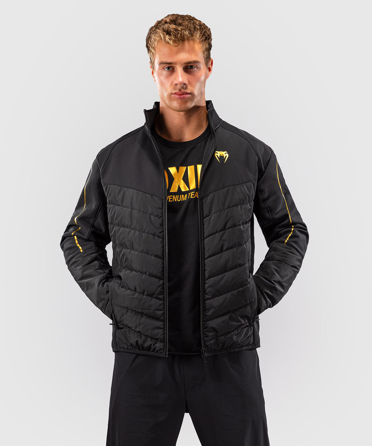 Venum Paddock Chaqueta softshell - Negro/Dorado