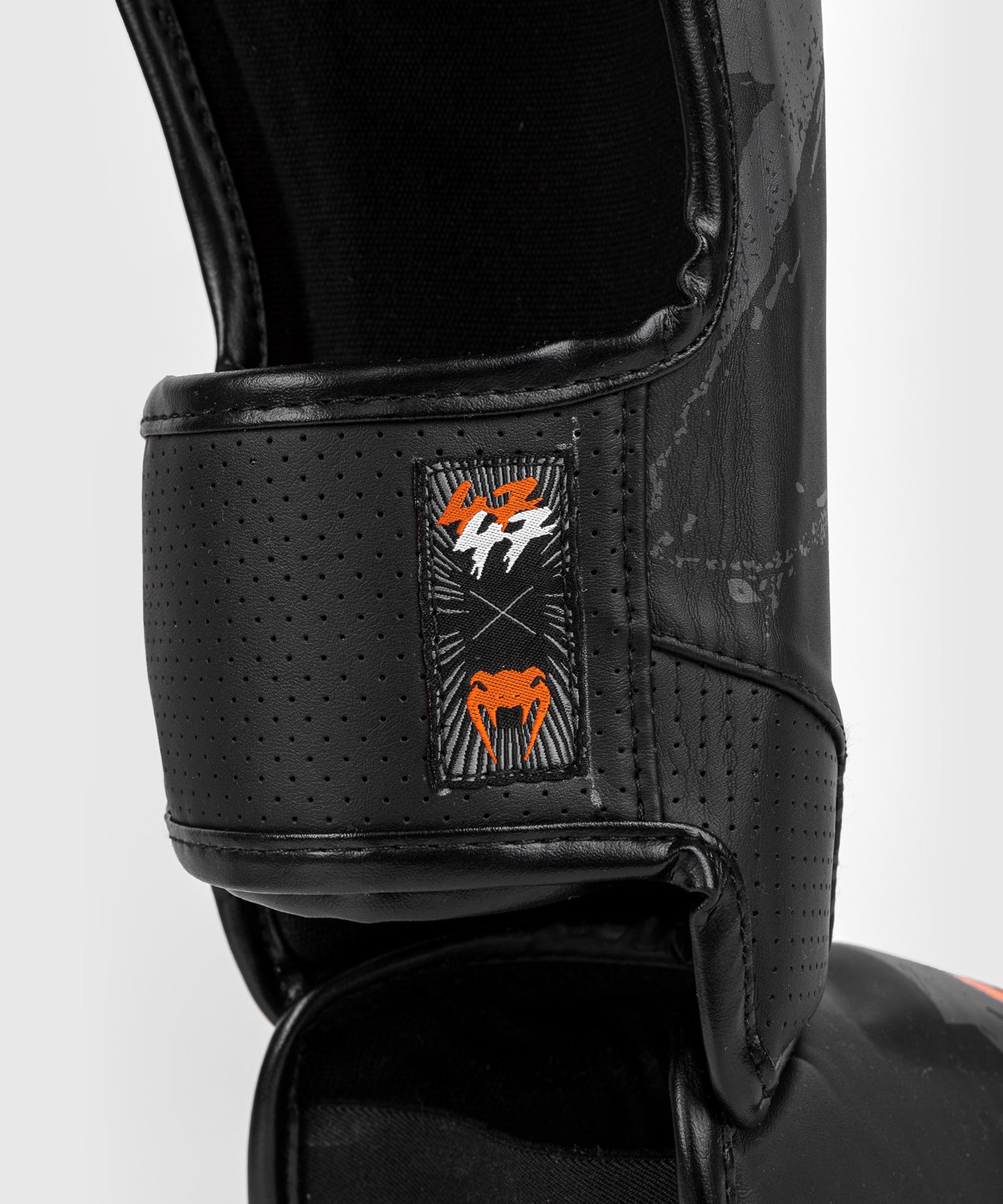 Protège-tibias Venum S47 - Noir/Orange