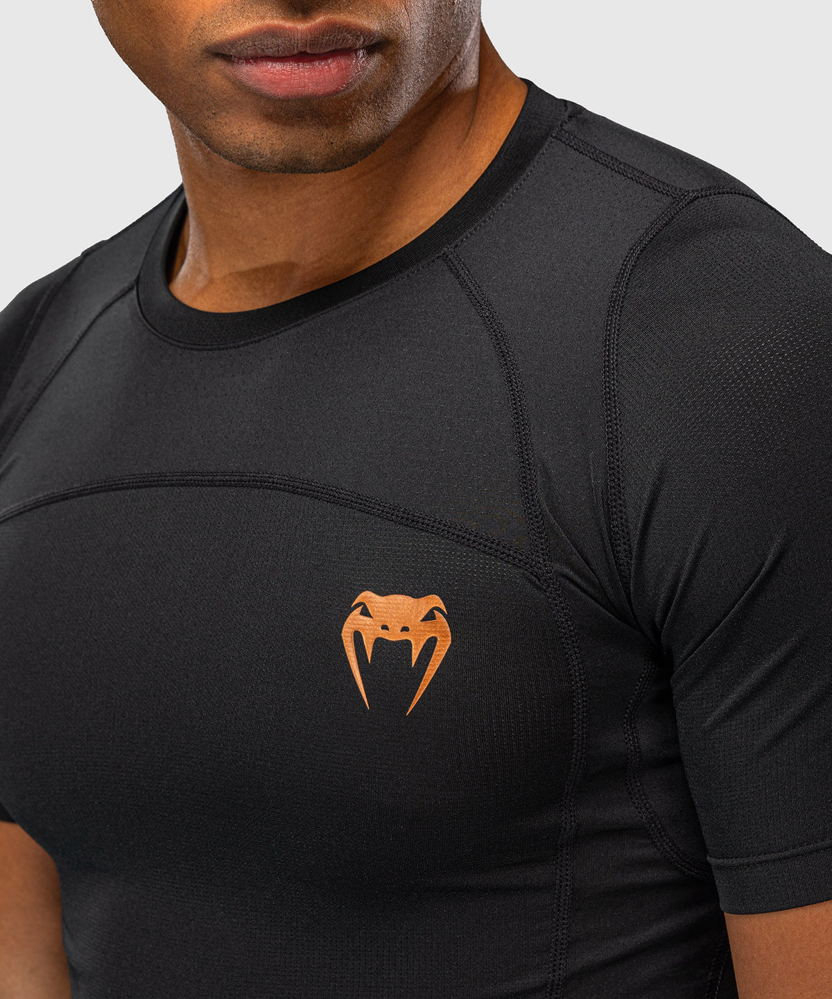 Venum G-Fit Revolution Kurzarm-Rashguard - Schwarz/Kupfer
