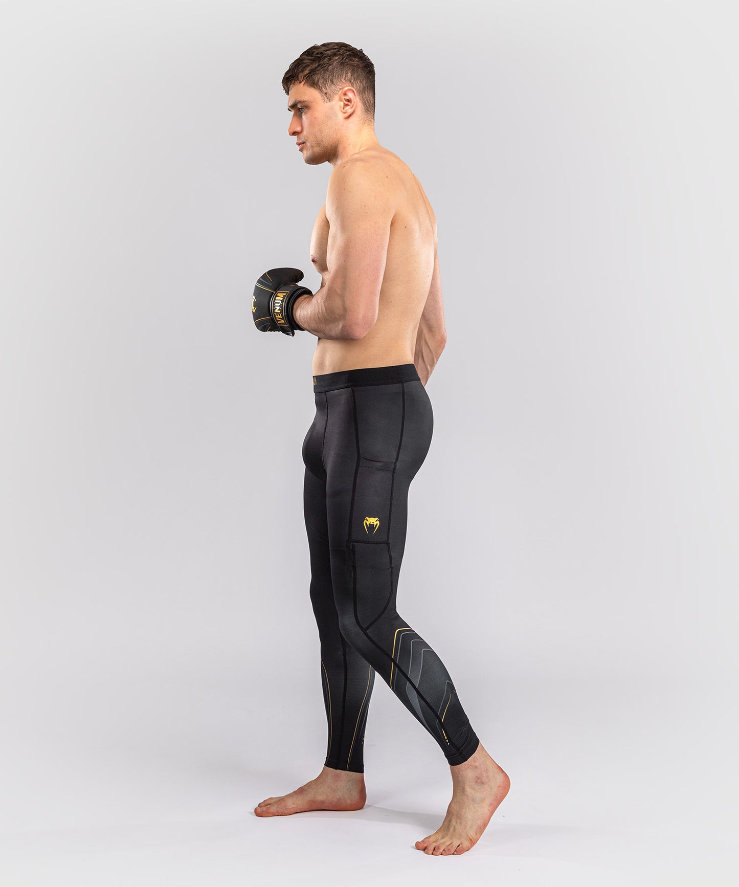 Venum Streamline Spats – Schwarz/Gold