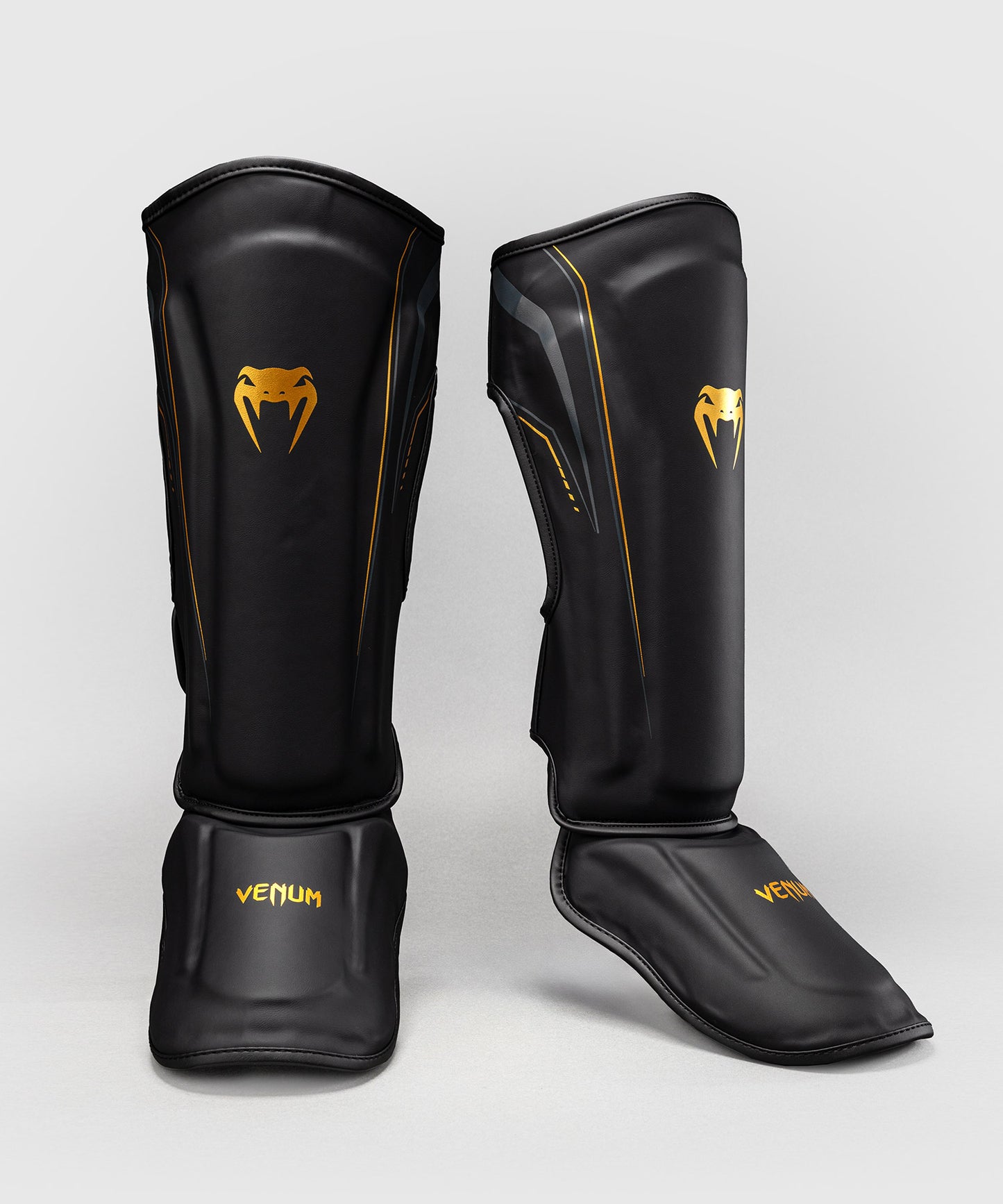 Venum Streamline Schienbeinschoner – Schwarz/Gold