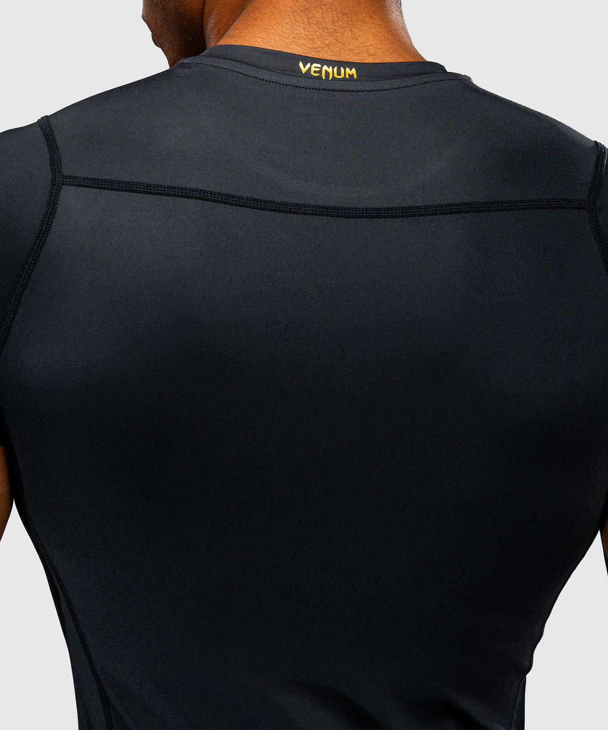 Rashguard manches courtes Venum Attack - Noir/Or