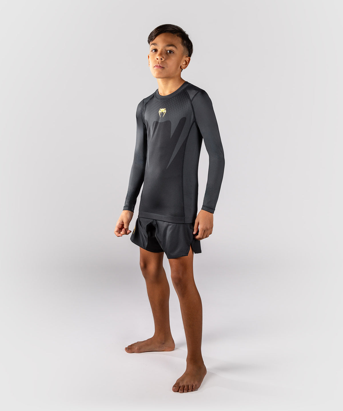 Venum Attack Rashguard de manga larga para niños - Negro/Dorado