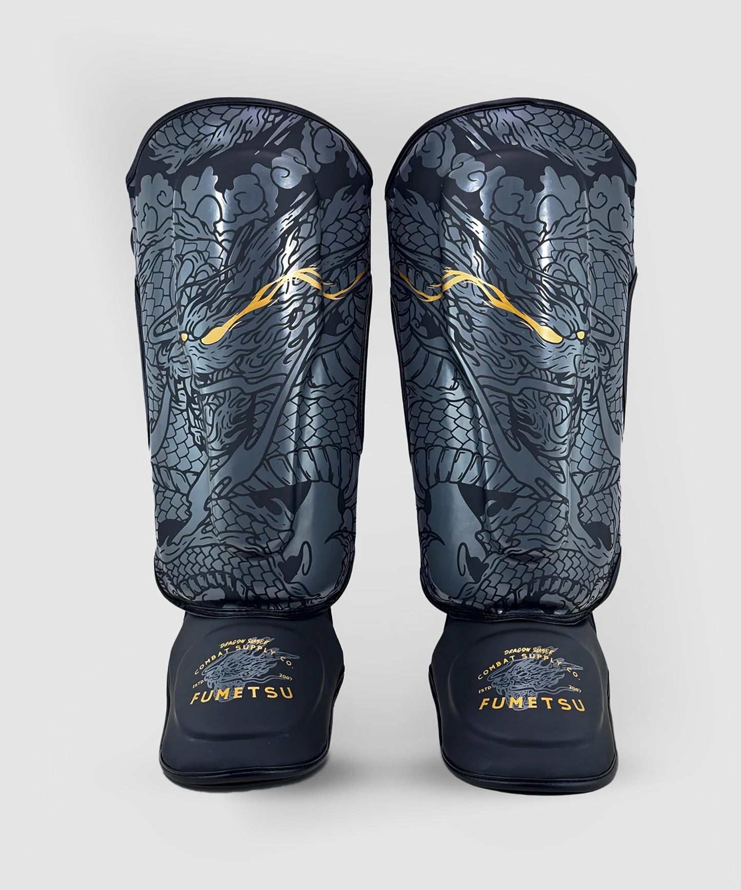 Fumetsu Dragon Slayer shin guards - Black/Gold