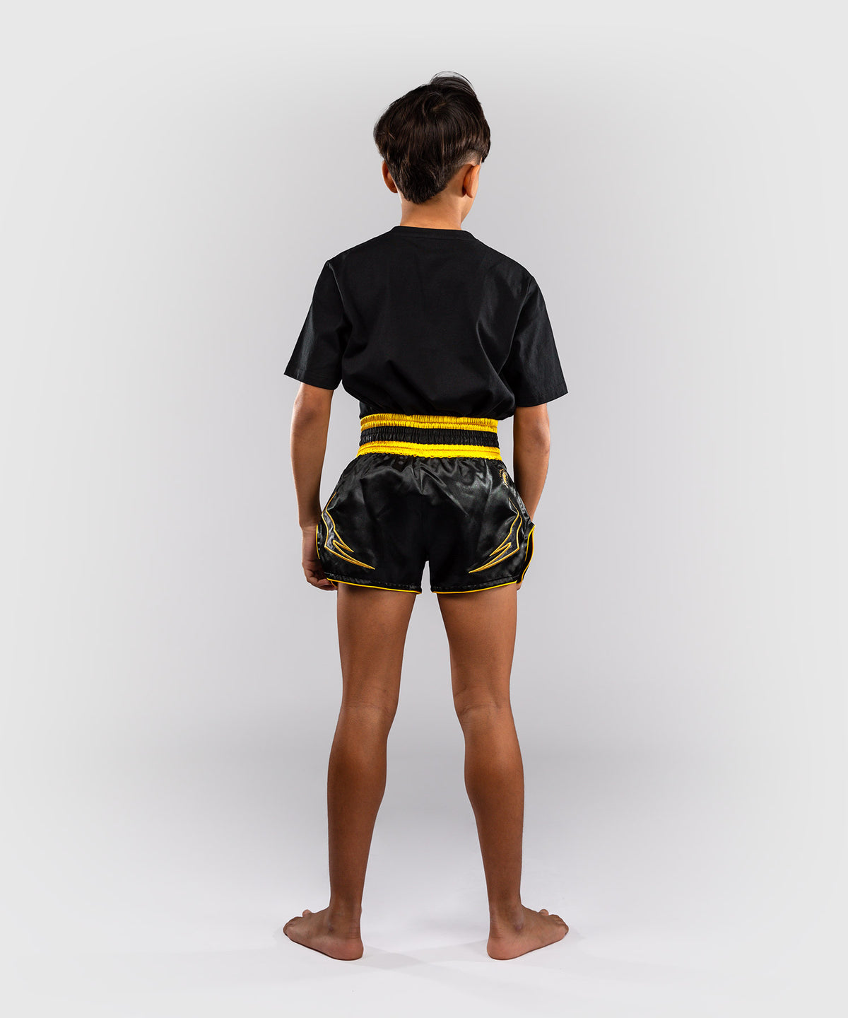 Venum Bangkok Fury Pantalón corto de Muay Thai para niños - Negro/Dorado
