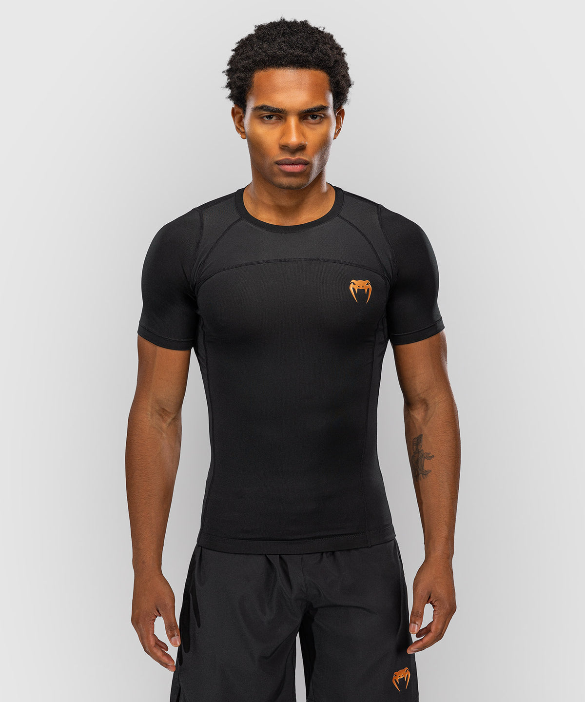 Venum G-Fit Revolution Kurzarm-Rashguard - Schwarz/Kupfer