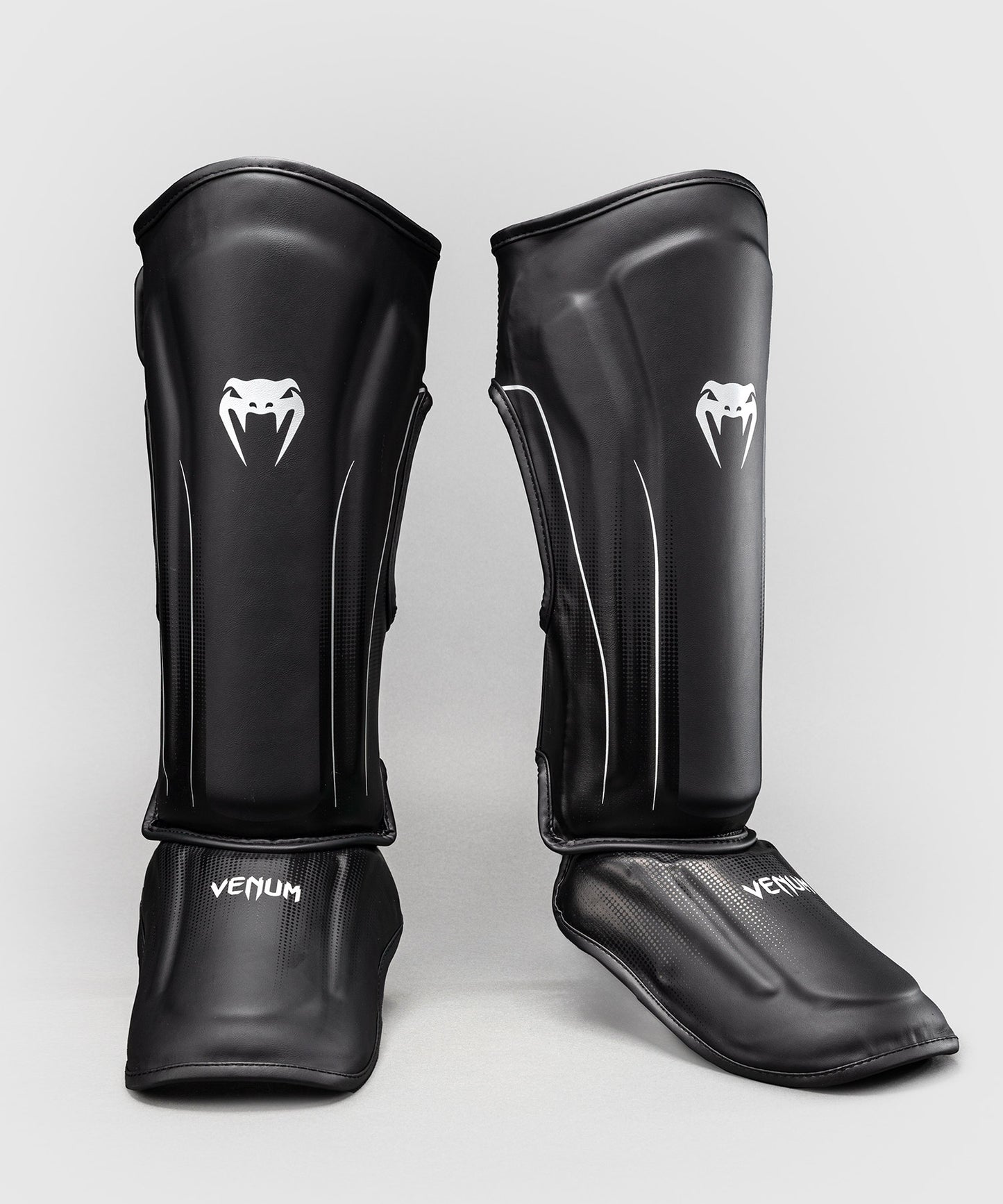 Venum Stealth Espinilleras – Negro/Blanco
