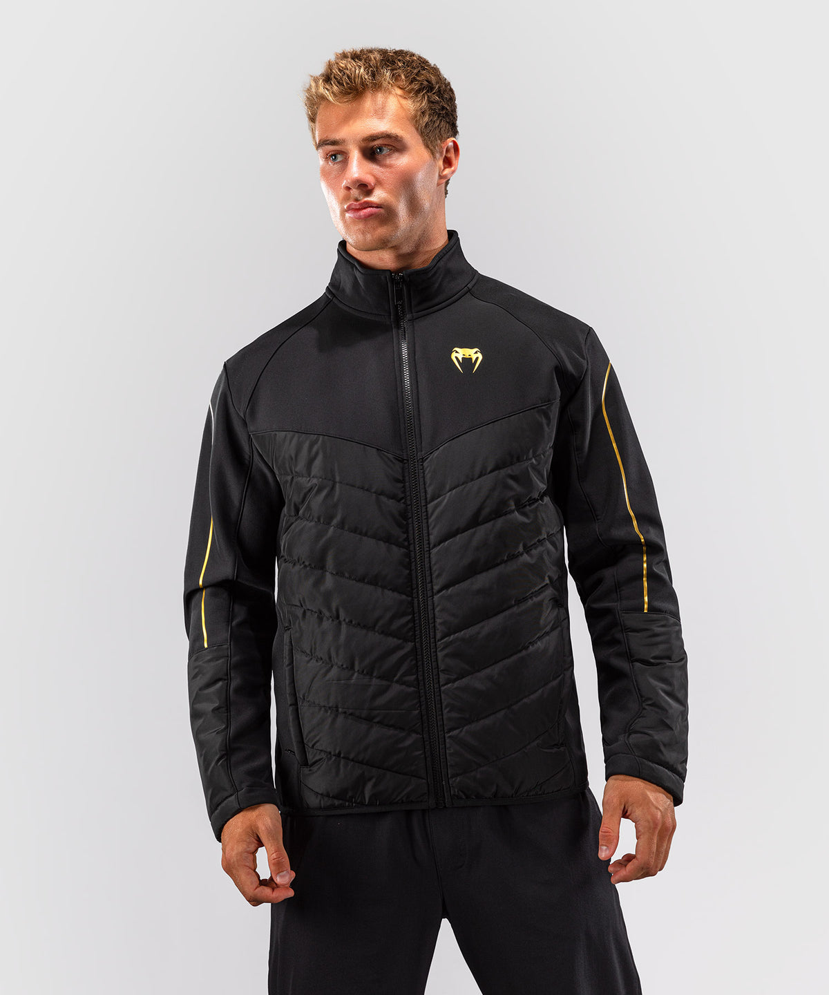 Venum Paddock Chaqueta softshell - Negro/Dorado