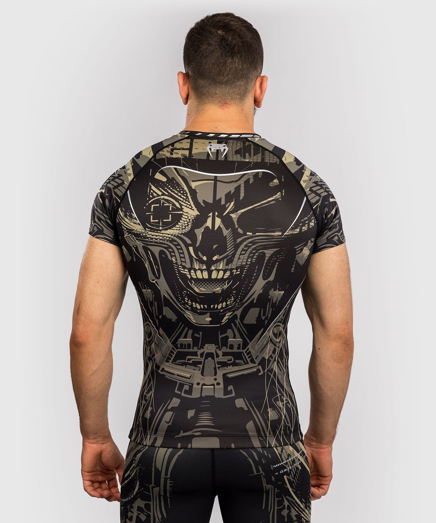 Venum Space Invader lycra de manga corta - Negro/Arena