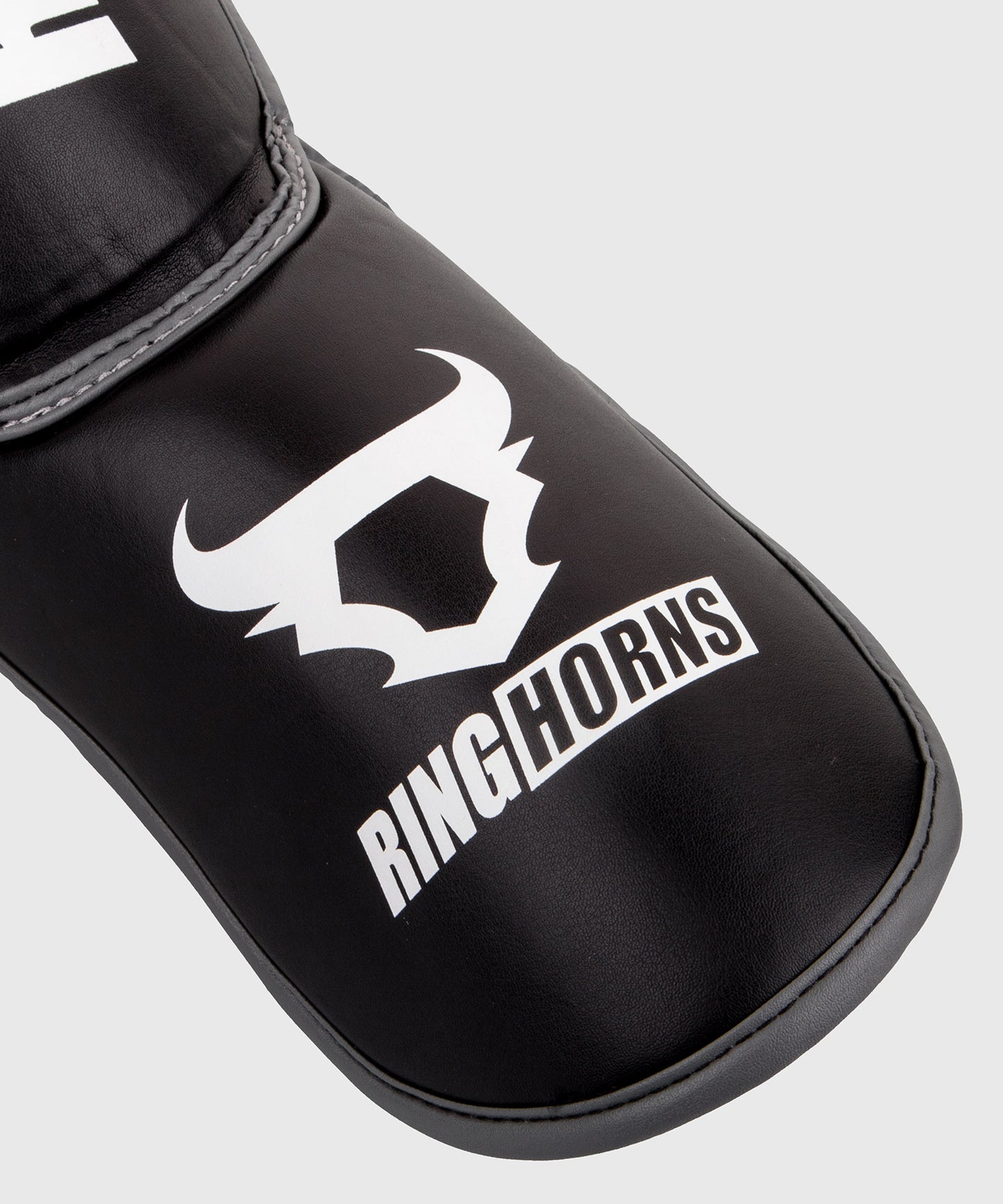 Protège-tibias et pieds Ringhorns Charger - Noir