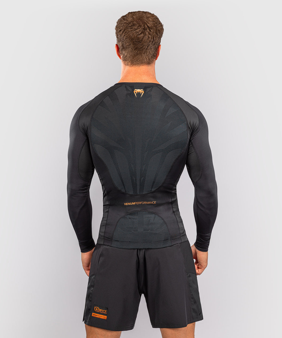 Venum G-Fit Revolution Rashguard de manga larga - Negro/Cobre