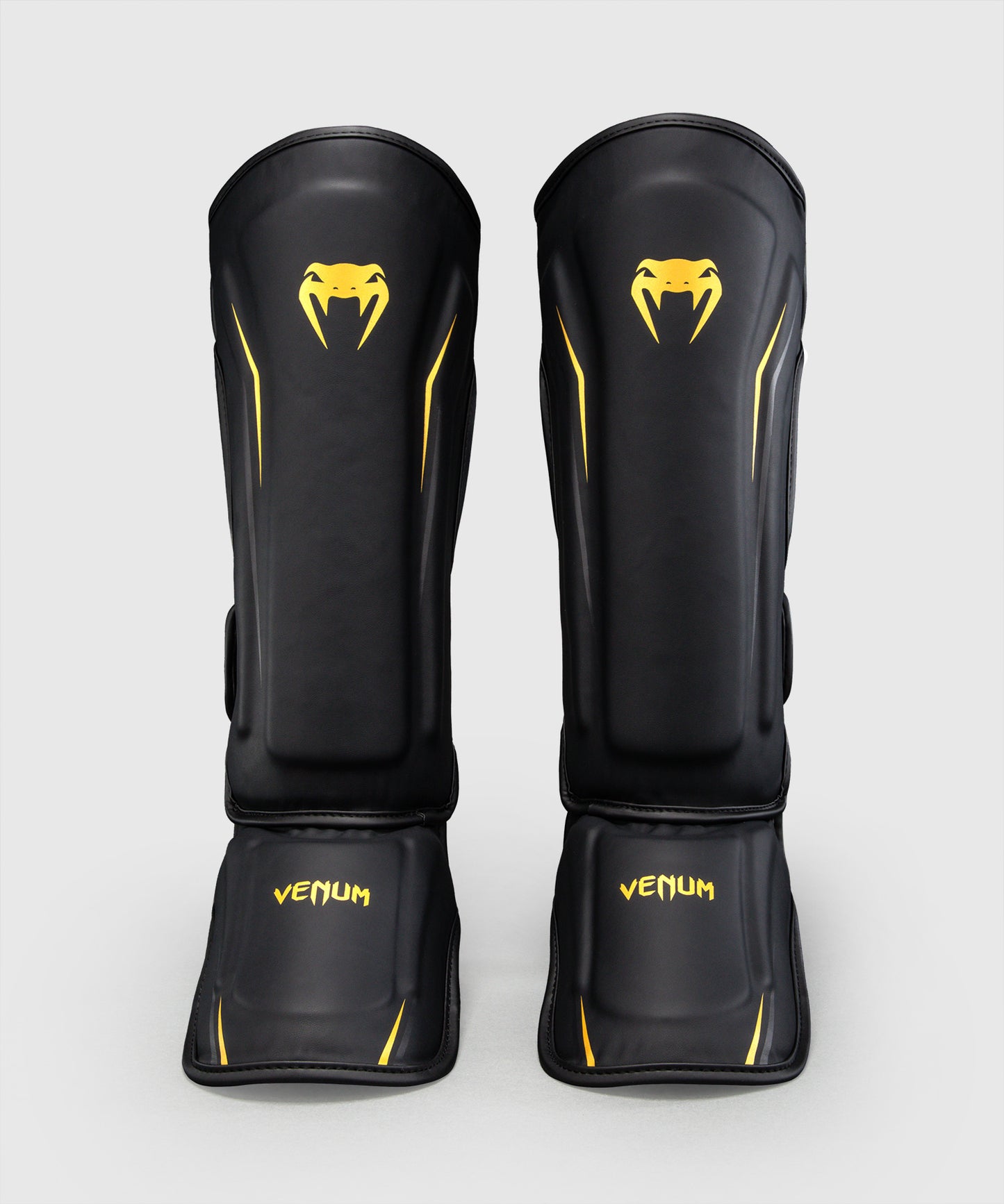 Venum G-Core Paratibie - Nero/Oro