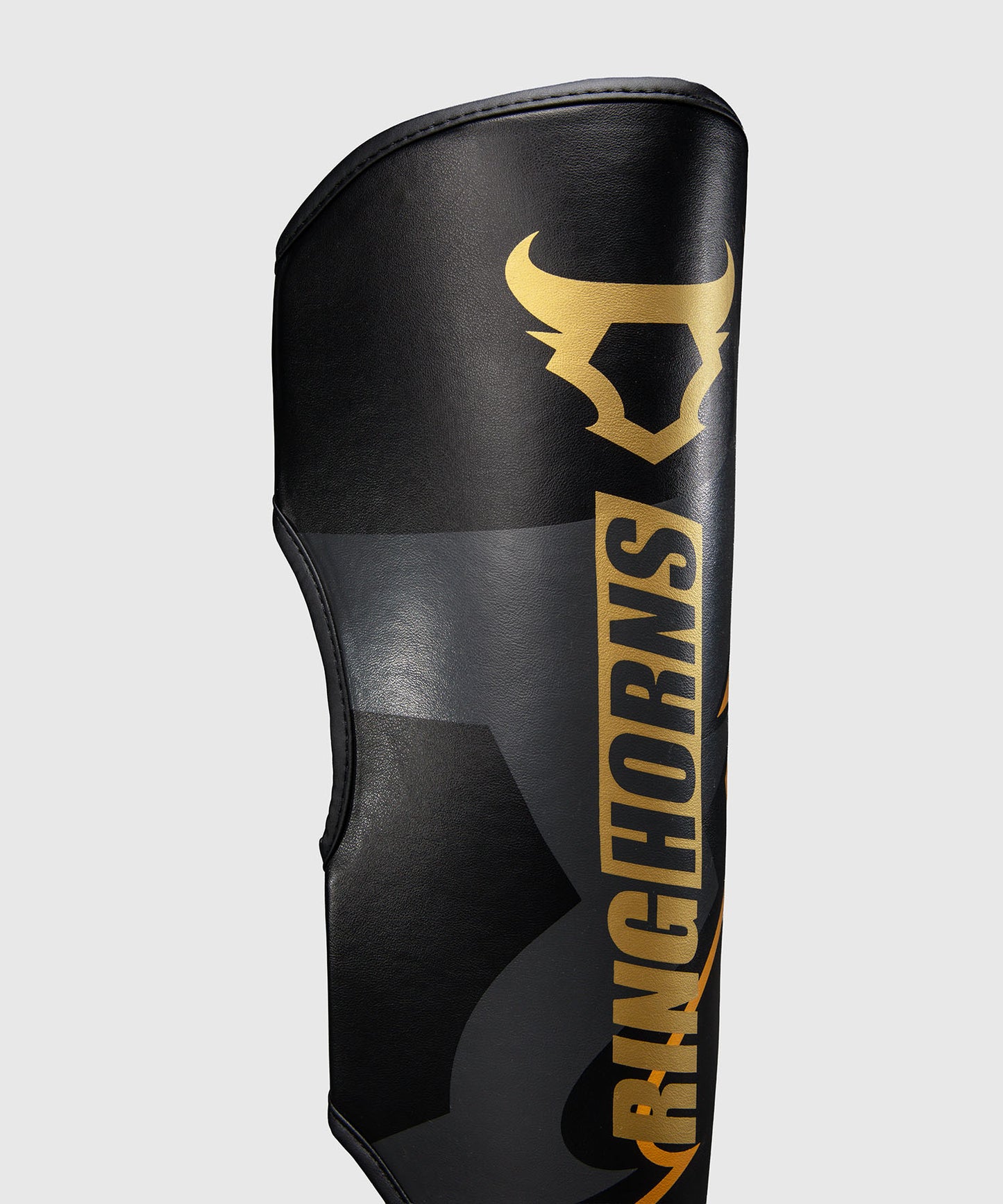 Protège-tibias Ringhorns Charger by Venum – Noir/Or