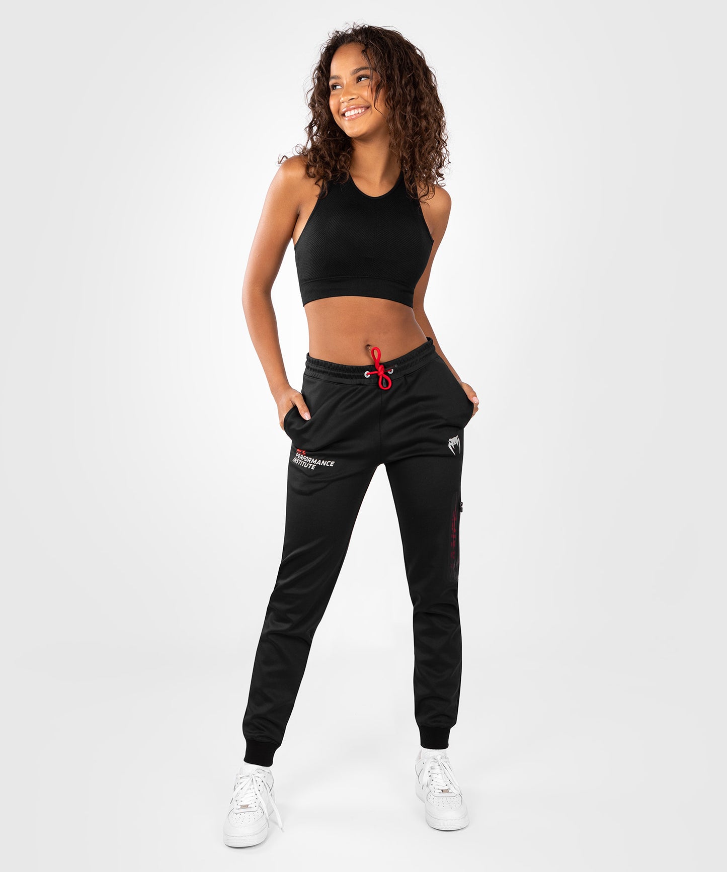 Venum Performance Institute 2.0 UFC Damen-Jogginghose - Schwarz/Rot