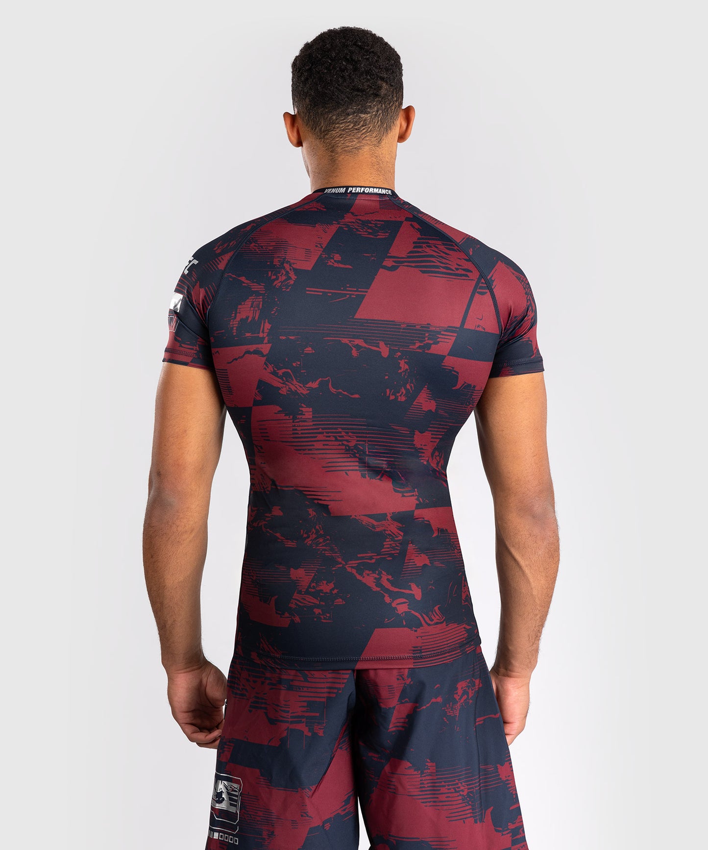 UFC Zenith by Venum Authentic Fight Week Rashguard de manga corta Performance Hombre - Azul marino/Burdeos/Plateado