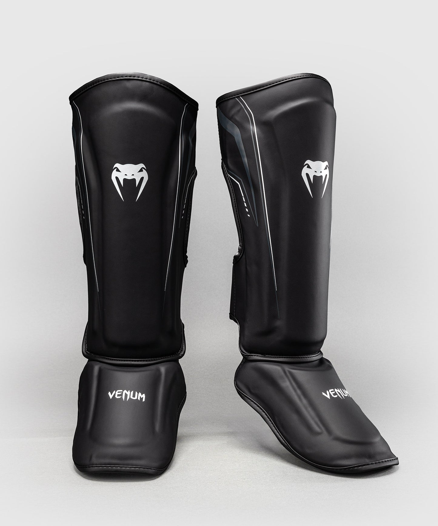 Venum Streamline Paratibie – Nero/Bianco