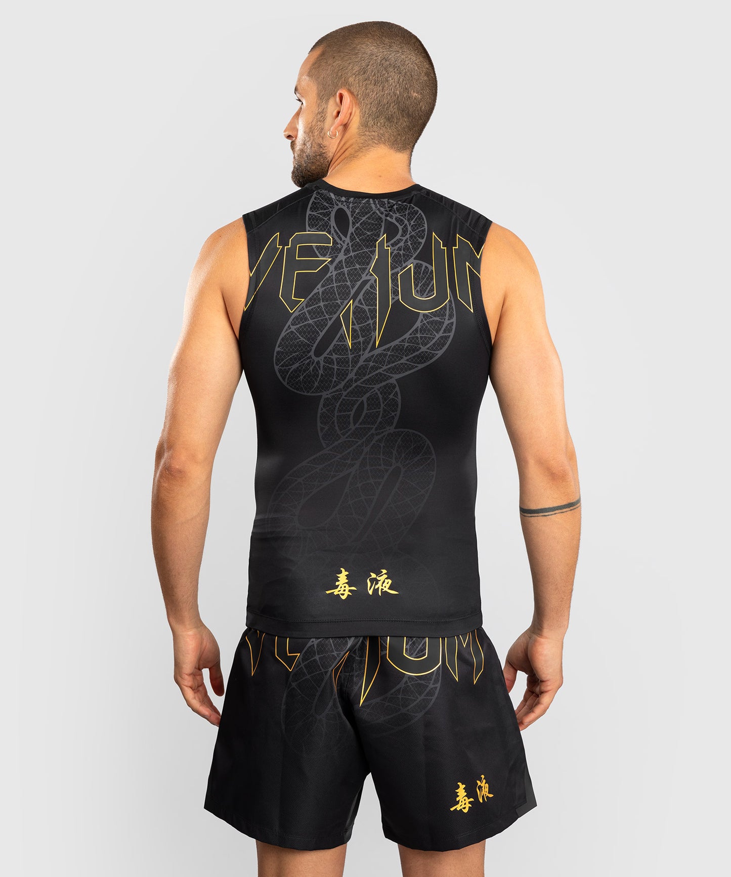 Rashguard Sans Manches Venum Serpenti – Noir/Argent/Or