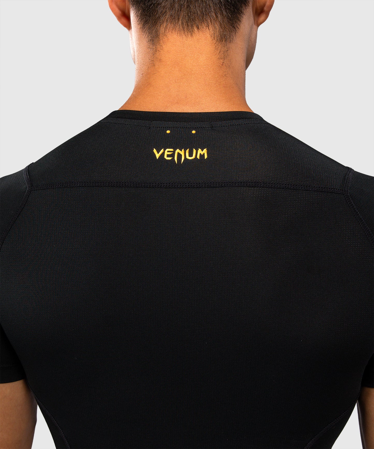 Venum G-Core Rashguard Manga Corta - Negro/Oro