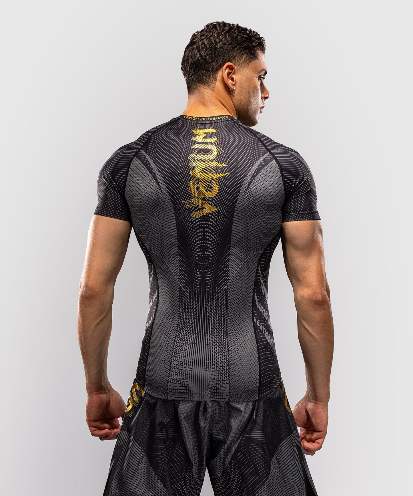 Venum Galactic 3.0 Kurzarm Rashguard - Schwarz/Gold