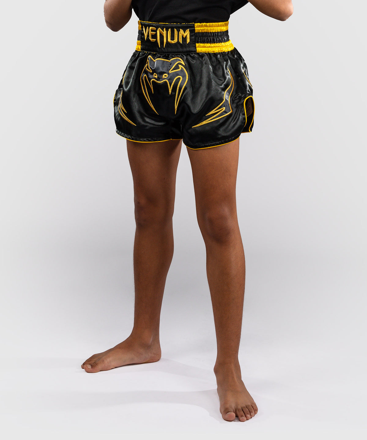 Venum Bangkok Fury Pantalón corto de Muay Thai para niños - Negro/Dorado
