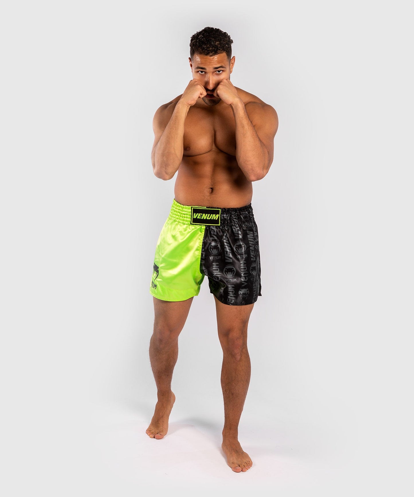 Venum Logos Muay Thai Shorts - Black/Yellow