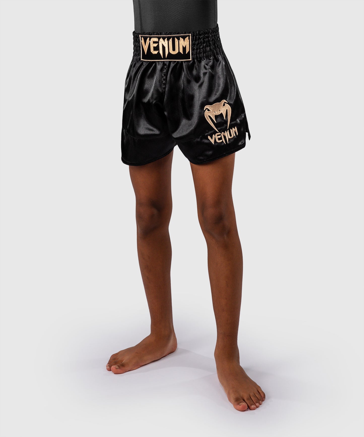 Venum Classic Muay-Thai-Shorts für Kinder – Schwarz/Gold