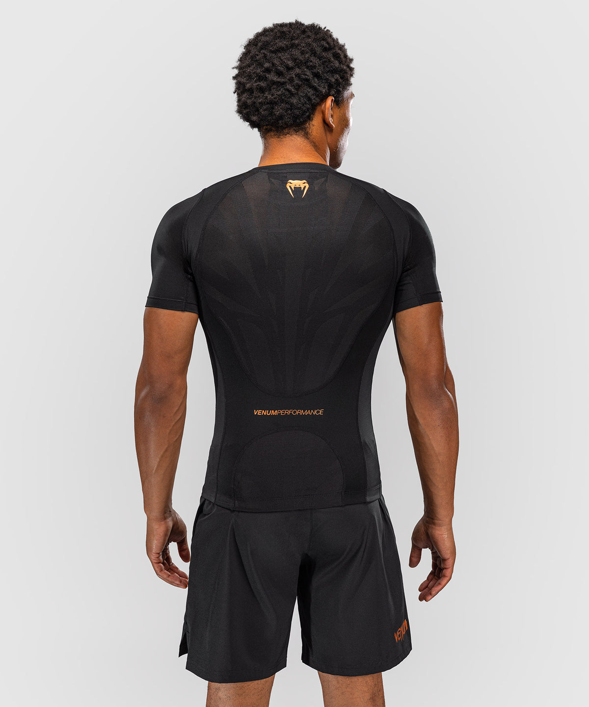 Venum G-Fit Revolution Kurzarm-Rashguard - Schwarz/Kupfer