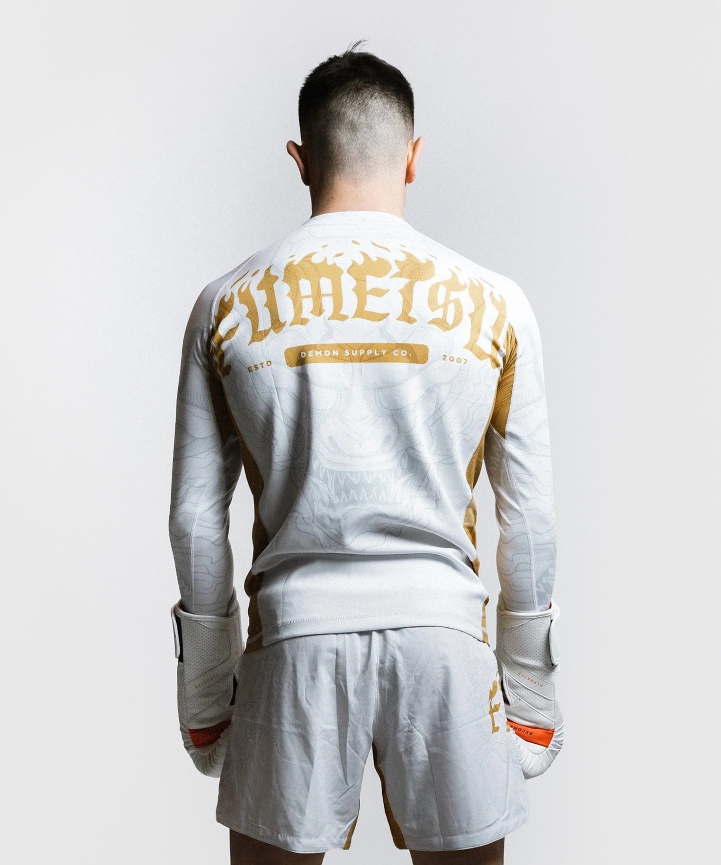 Fumetsu Oni Long Sleeve Rashguard - White/Gold/Grey
